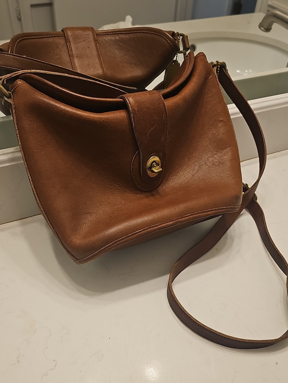 Coach Vintage Classic Brown Leather Crossbody Bag with Turn-Lock Closure